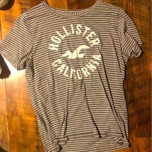 grey and white striped size small Hollister tshirt logo